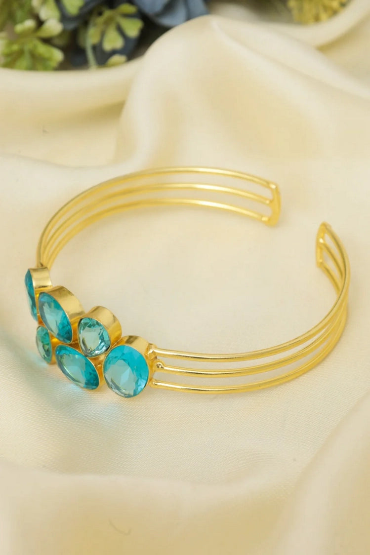 Picture of Zehnaz - Gold-Tone Multi-Band Cuff Bracelet with Blue Gemstones - Available at Raja Sahib