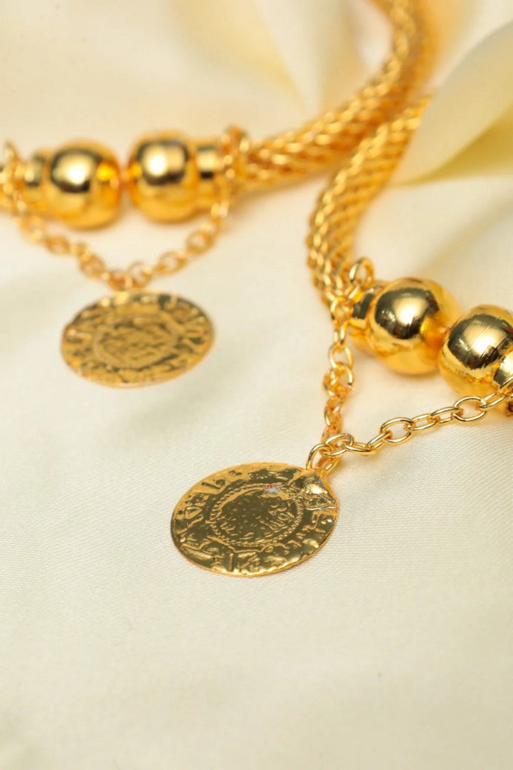 Picture of Zehnaz - Gold-Tone Paired Twisted Bangle Bracelet with Hammered Coin Charm Stackable Fashion Jewelry - Available at Raja Sahib